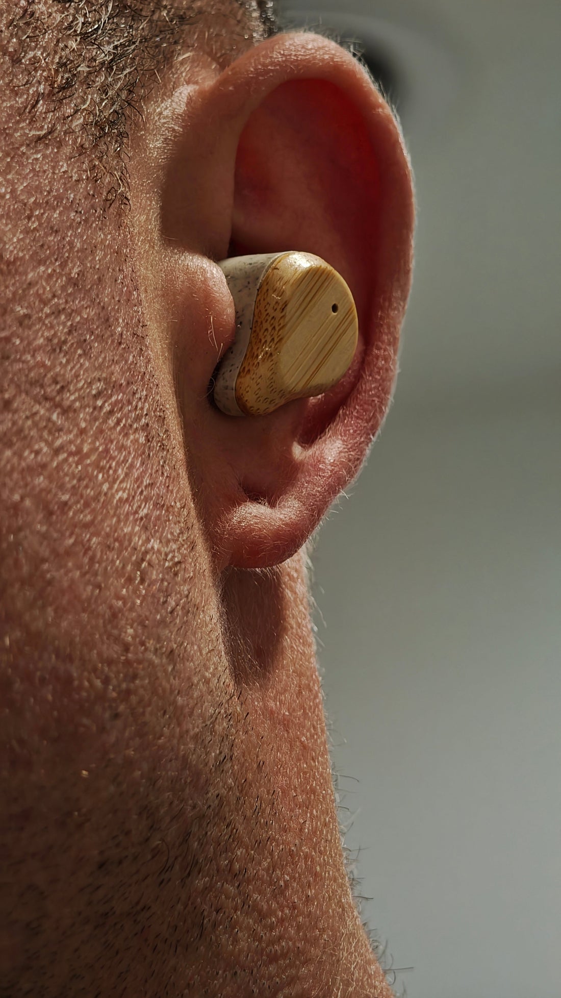 PureBuds Pro earbud close up in an ear