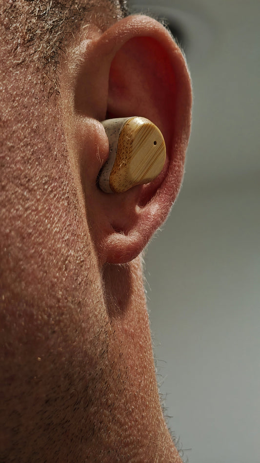 PureBuds Pro earbud close up in an ear
