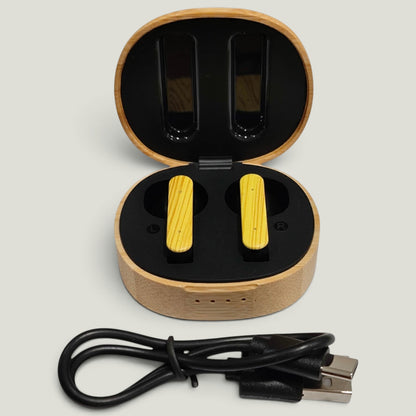 We Pure PurePods open-fit earbuds with yellow wood-grain finish inside a sustainable bamboo charging case with cable.