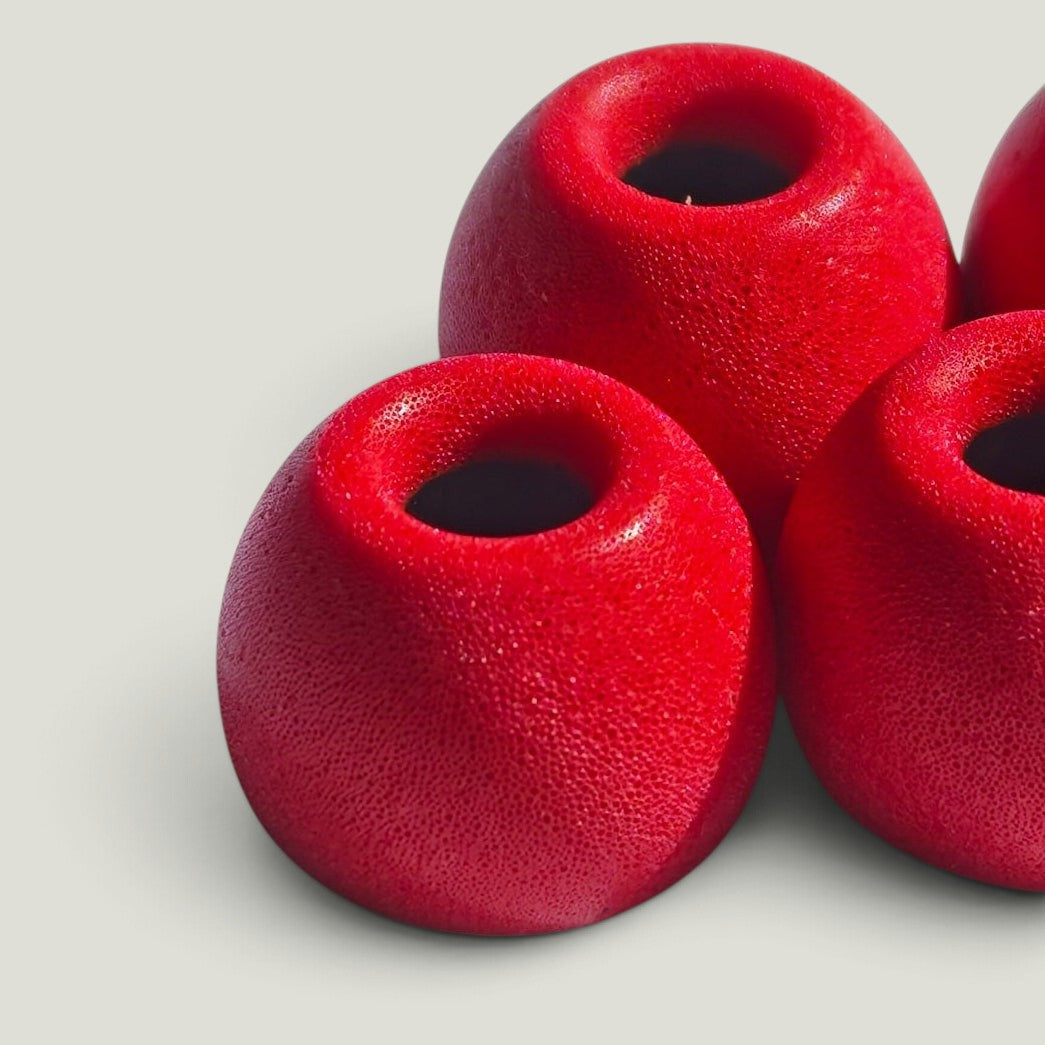 We Pure Tradie Red memory foam ear tips for noise isolation, designed for a comfortable and secure fit.