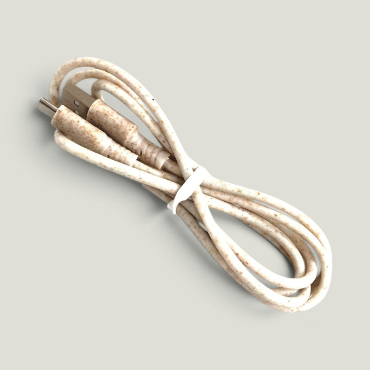 We Pure 1m USB-C cable made from eco-friendly beige wheat straw plastic with a speckled textured finish